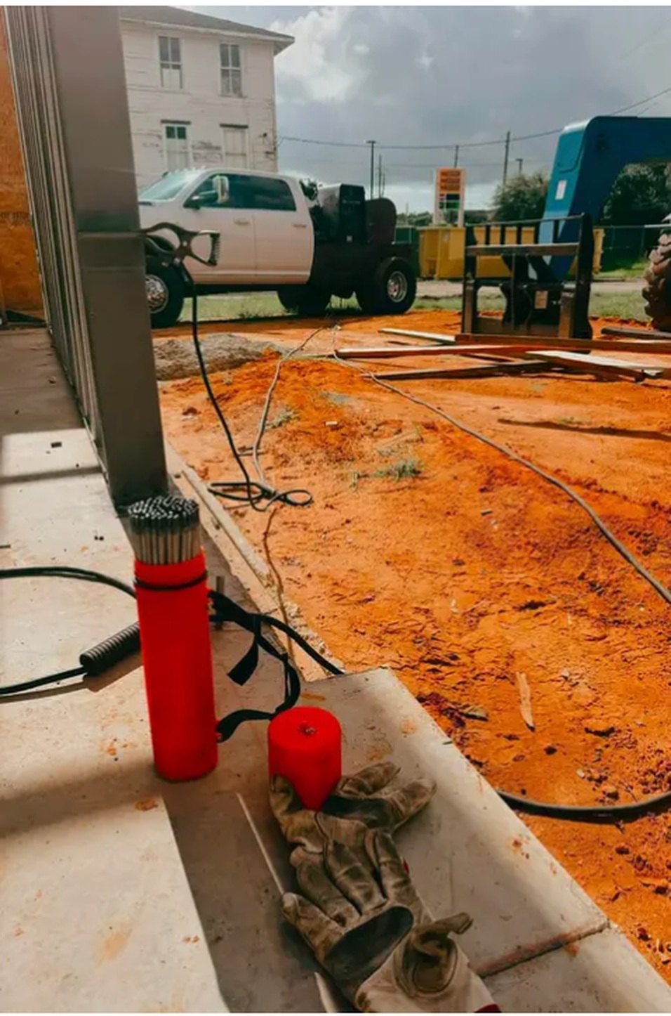 Base plate welding underway on a job site in Mobile, Alabama